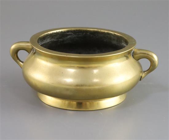 A Chinese polished bronze gui censer, Xuande mark, 18th/19th century, W. 17.5cm